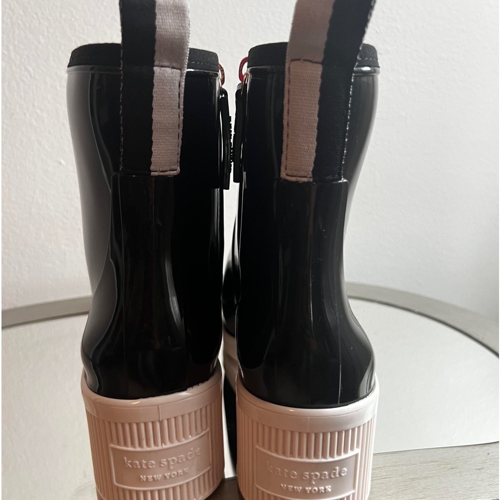 Authentic -Kate Spade  black-rubber, side zippers , new without tags.